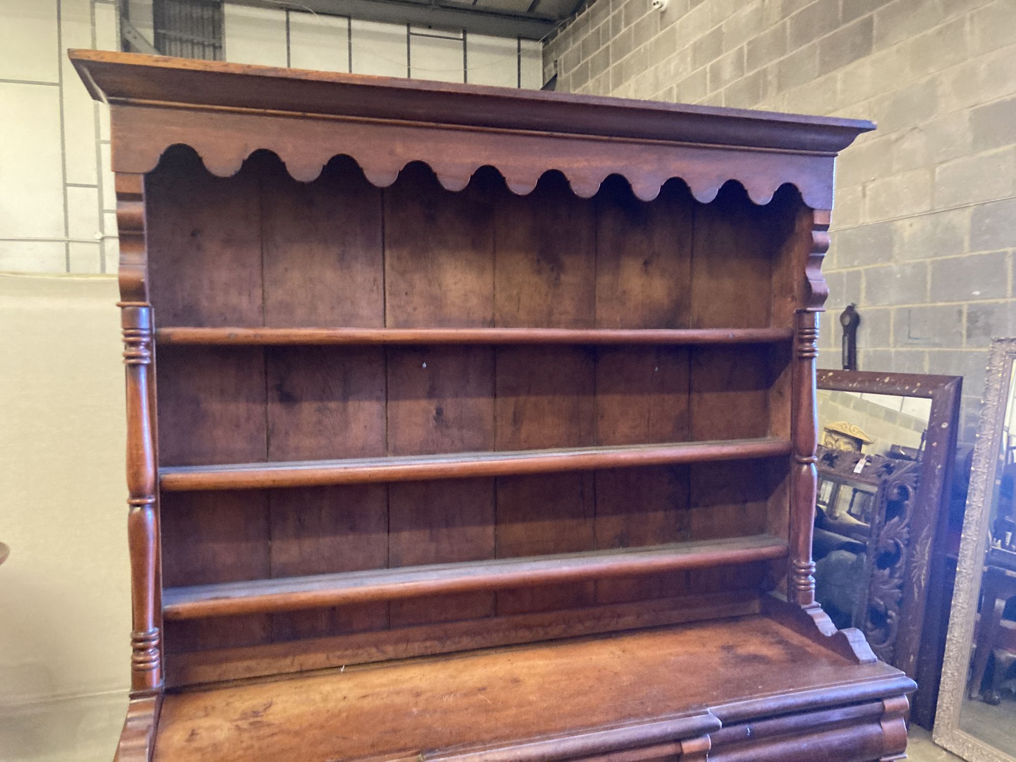 A Victorian North Country mahogany and pine breakfront dresser, width 165cm, depth 49cm, height 217cm